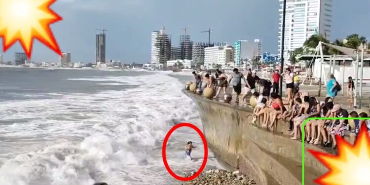 Video. ¡Imprudente mujer ignora advertencia por huracán ‘Norma’ y cae al mar!